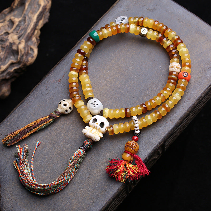 EverestArtstudios Golden Armor Bead 108-Bead Mala with Antler and Pearl Accents