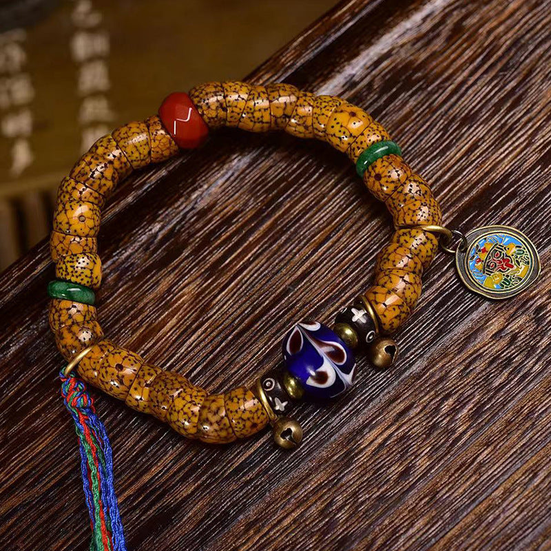 EverestArtstudios Xingyue Bodhi Seed Sculpted Bead Tassel Bracelet