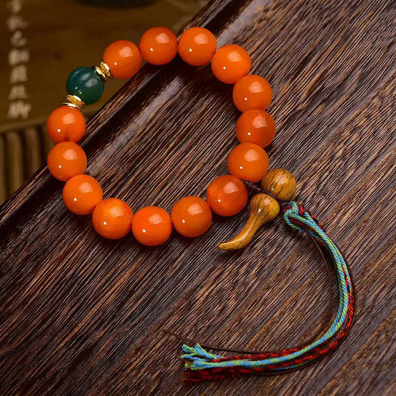 EverestArtstudios Reclaimed Golden Turtle Bead Tassel Bracelet