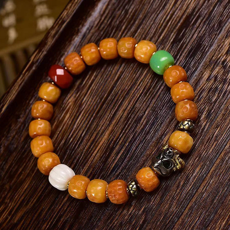 EverestArtstudios Bone Textured Barrel Bead Garuda Accent Bracelet