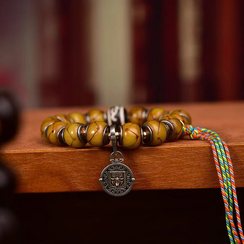 EverestArtstudios Bone Inlaid Barrel Bead Tassel Bracelet