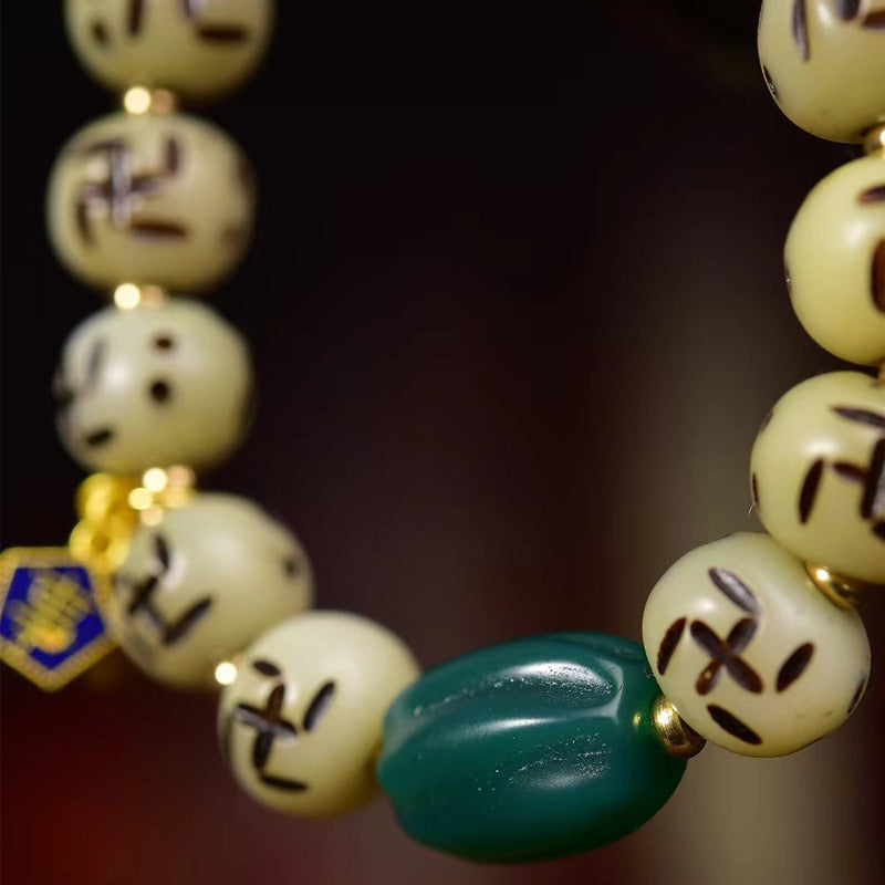 EverestArtstudios Bone Auspicious Symbol Carved Bead Bracelet