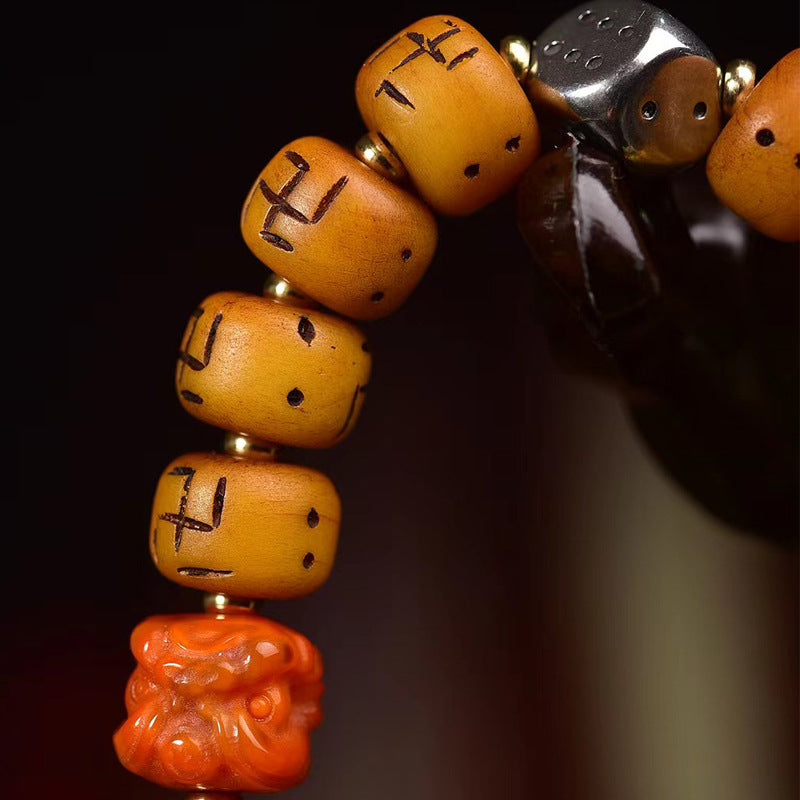 EverestArtstudios Bone Auspicious Symbol Barrel Bead Bracelet