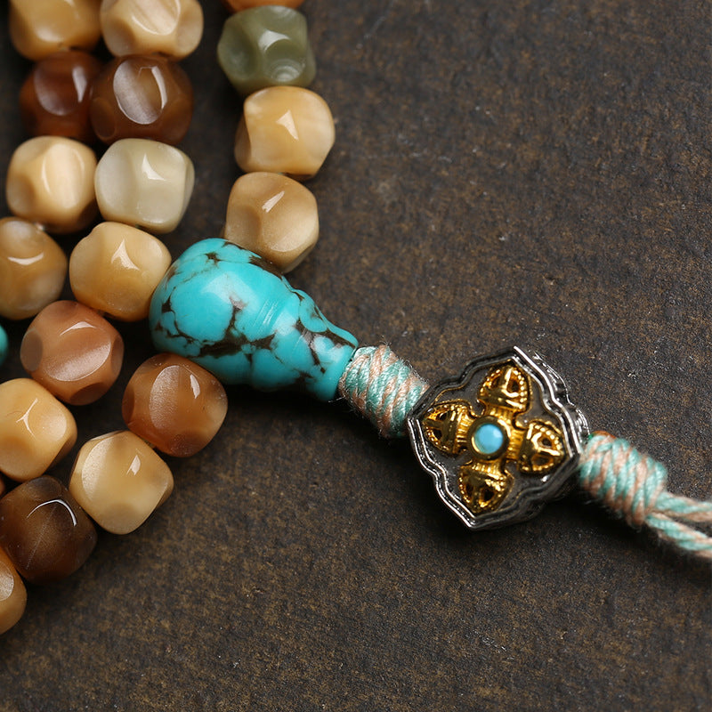 EverestArtstudios Faceted Bodhi 108-Bead Mala with Turquoise and Obsidian Accents