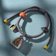 EverestArtstudios Medicine Buddha Ghau Pendant Woven Bracelet