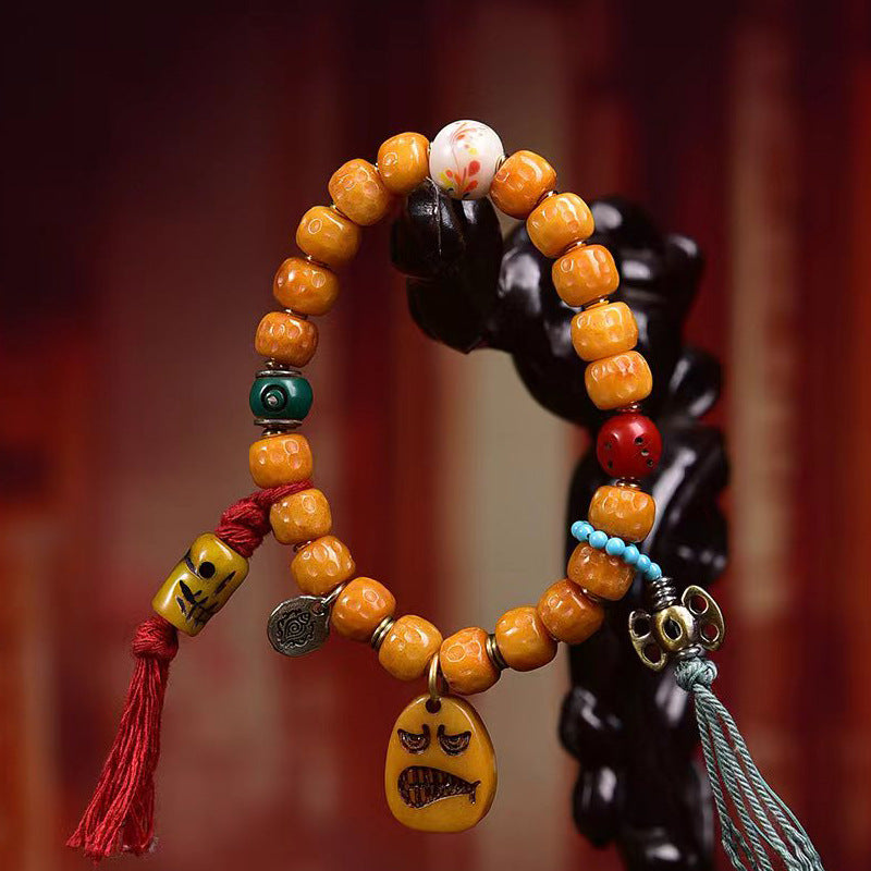 EverestArtstudios Bone Textured Barrel Bead Garuda Accent Bracelet