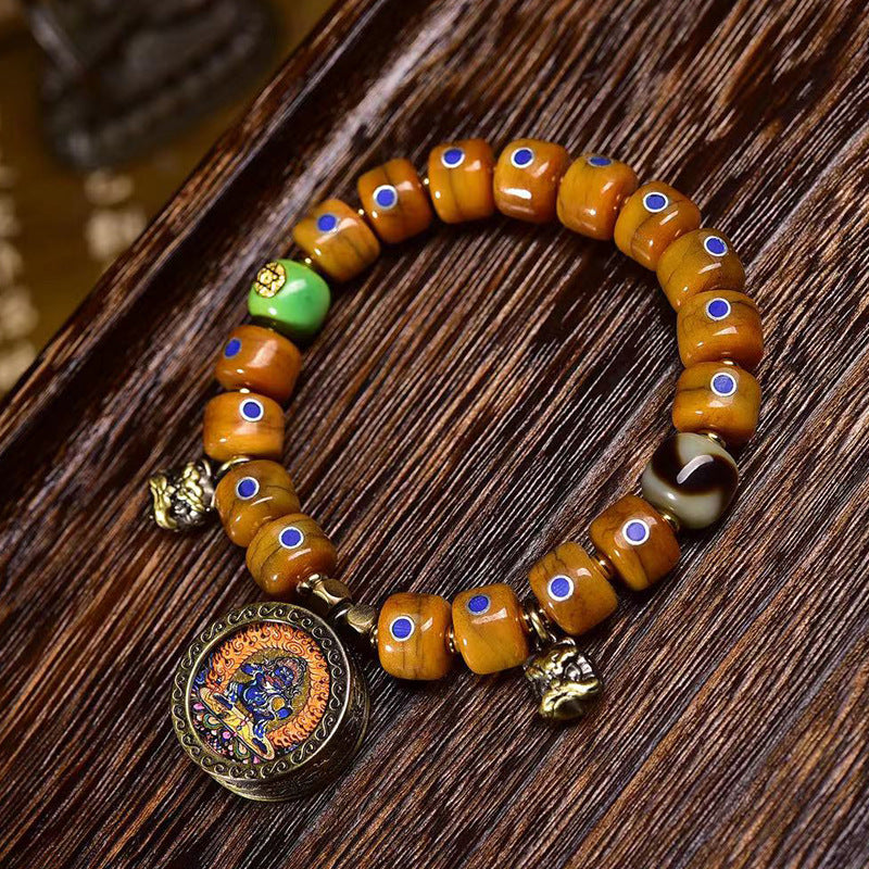 EverestArtstudios Yak Bone Lapis Inlay Thangka Charm Bracelet