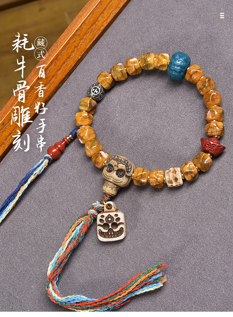 EverestArtstudios Bone Carved Seed-Pattern Tassel Bracelet