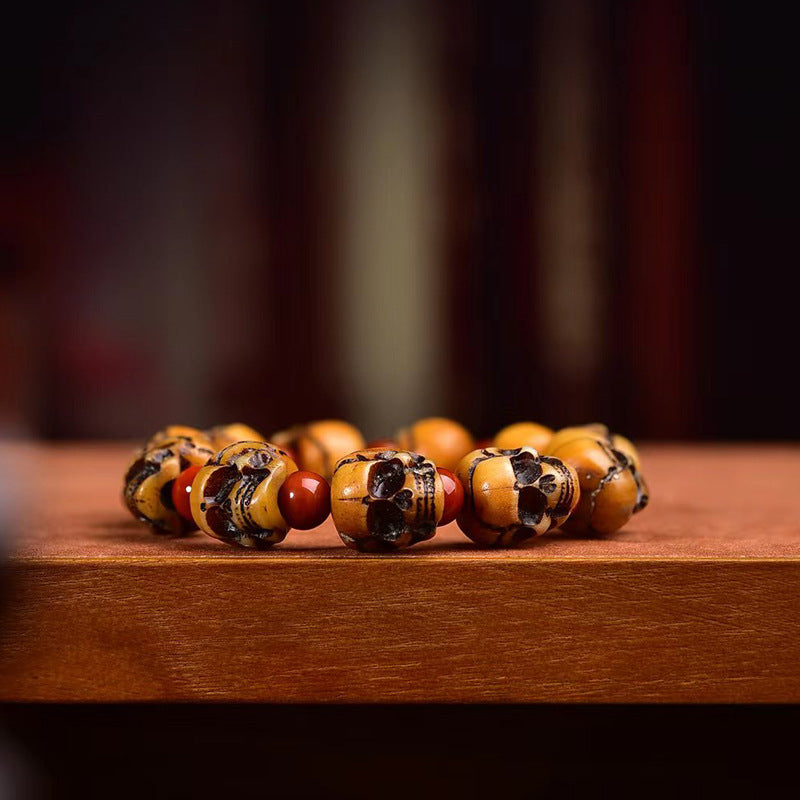 EverestArtstudios Camel Bone Carved Skull Bead Bracelet
