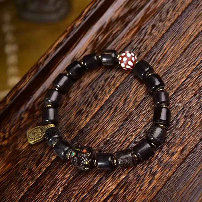 EverestArtstudios Dark Horn-Style Barrel Bead Bracelet