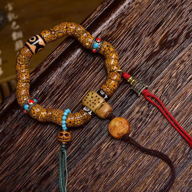 EverestArtstudios Xingyue Bodhi Seed Sculpted Bead Tassel Bracelet