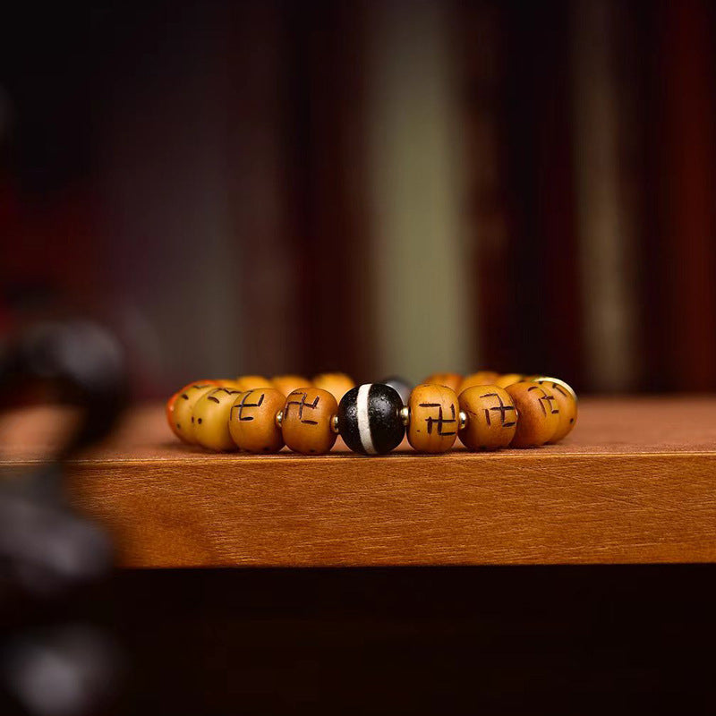 EverestArtstudios Bone Auspicious Symbol Barrel Bead Bracelet