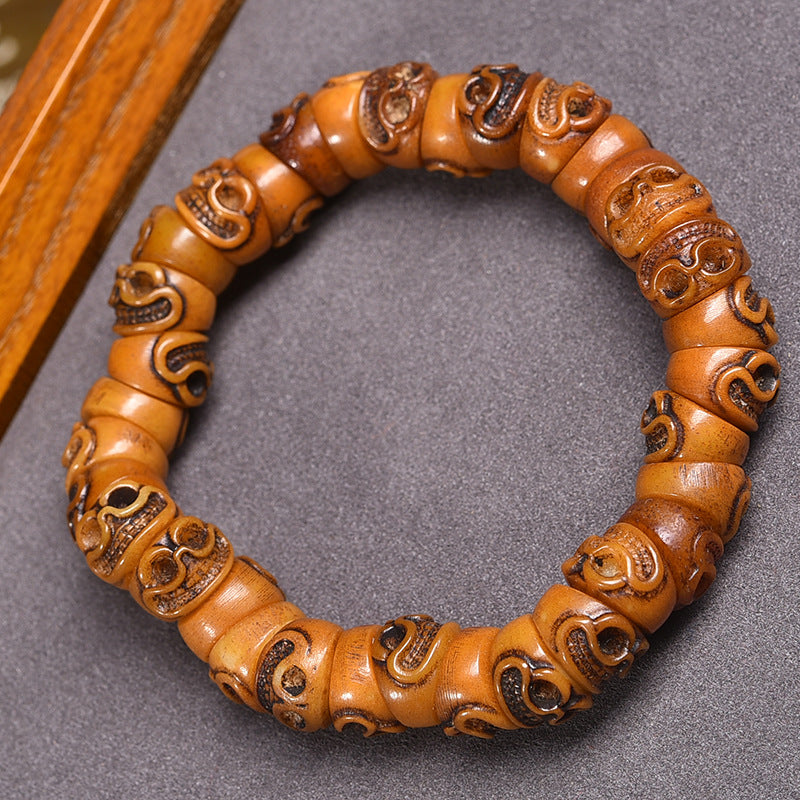 EverestArtstudios Bone Carved Motif Bead Bracelet
