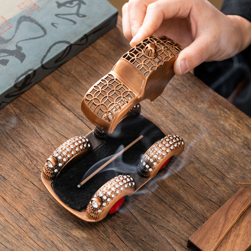 Diamond-encrusted car line incense burner Car aromatherapy burner can slide and decompress four-wheeled car creative aromatherapy burner ornament