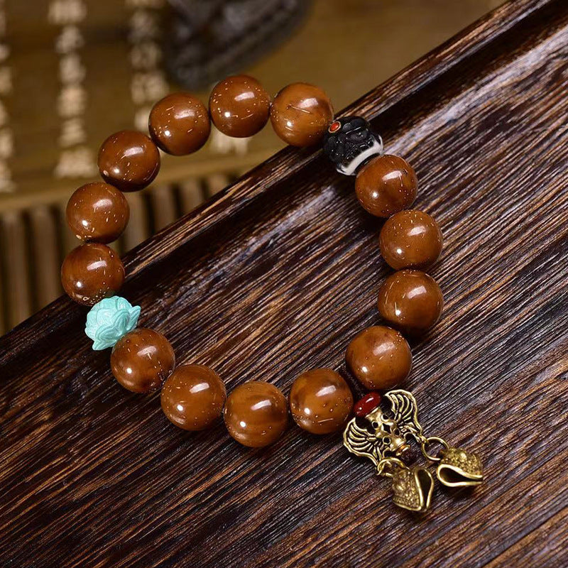 EverestArtstudios Three-Eyed Bodhi Seed Lotus Accent Bracelet