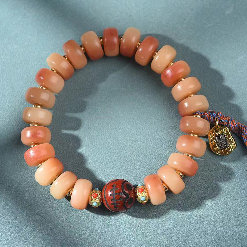 EverestArtstudios Camel Bone Blush Disc Bead Tassel Bracelet