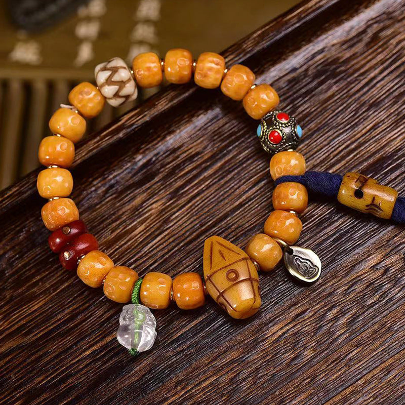 EverestArtstudios Bone Textured Barrel Bead Garuda Accent Bracelet