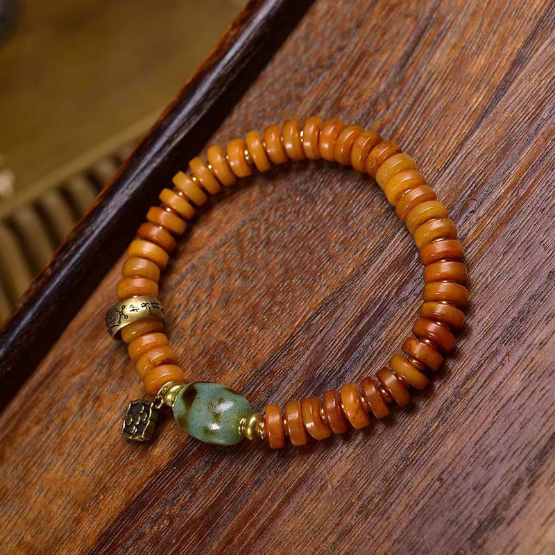 EverestArtstudios Bone Disc Bead Agate Dzi-Style Bracelet