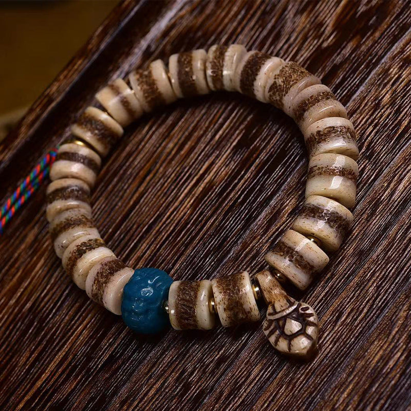 EverestArtstudios Yak Bone Textured Barrel Bead Bracelet