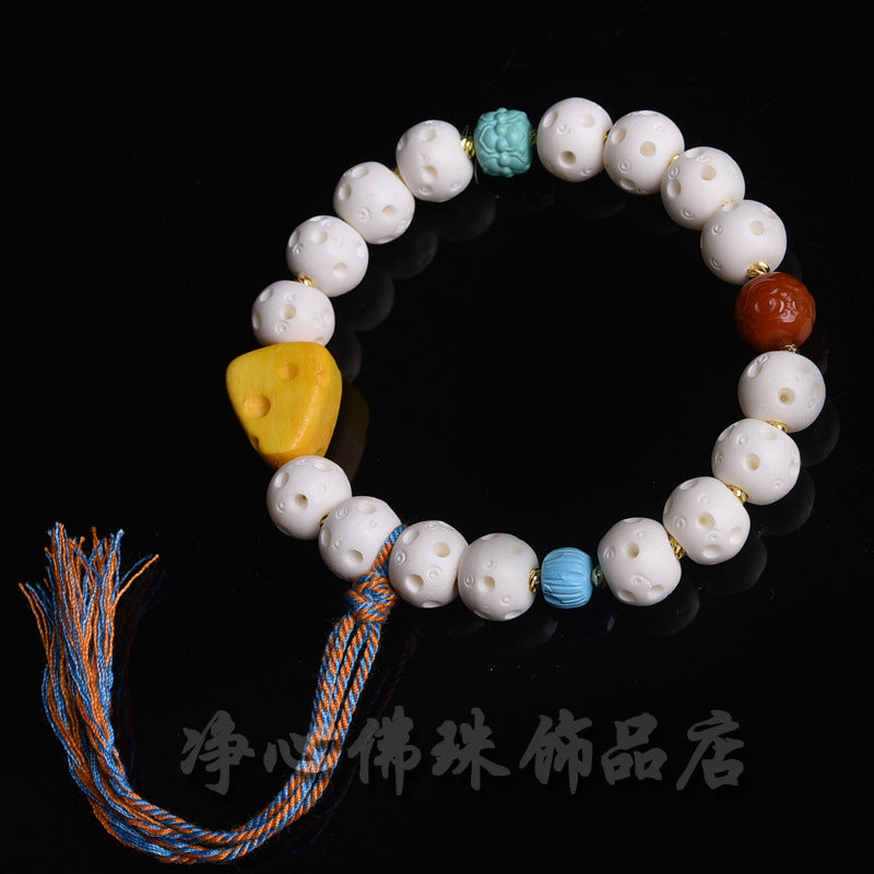 EverestArtstudios Deer Bone Openwork Bead Tassel Bracelet