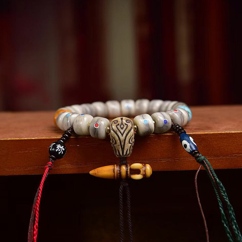 EverestArtstudios Bone Inlaid Barrel Bead Tassel Bracelet