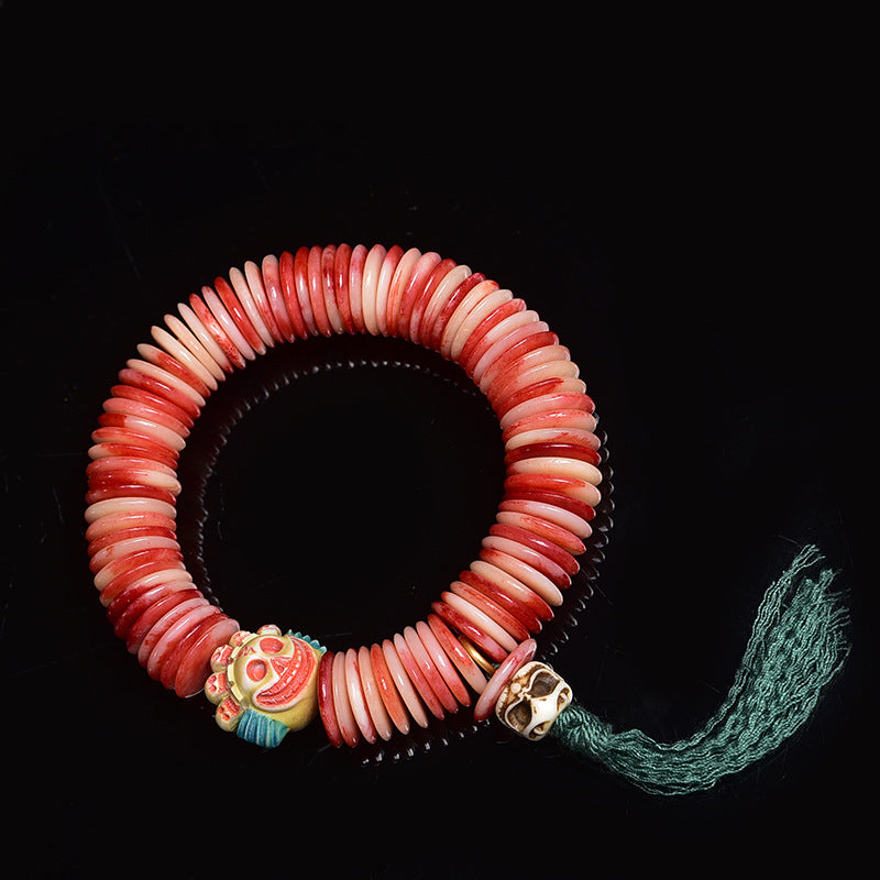 EverestArtstudios Camel Bone Disc Bead Tassel Bracelet