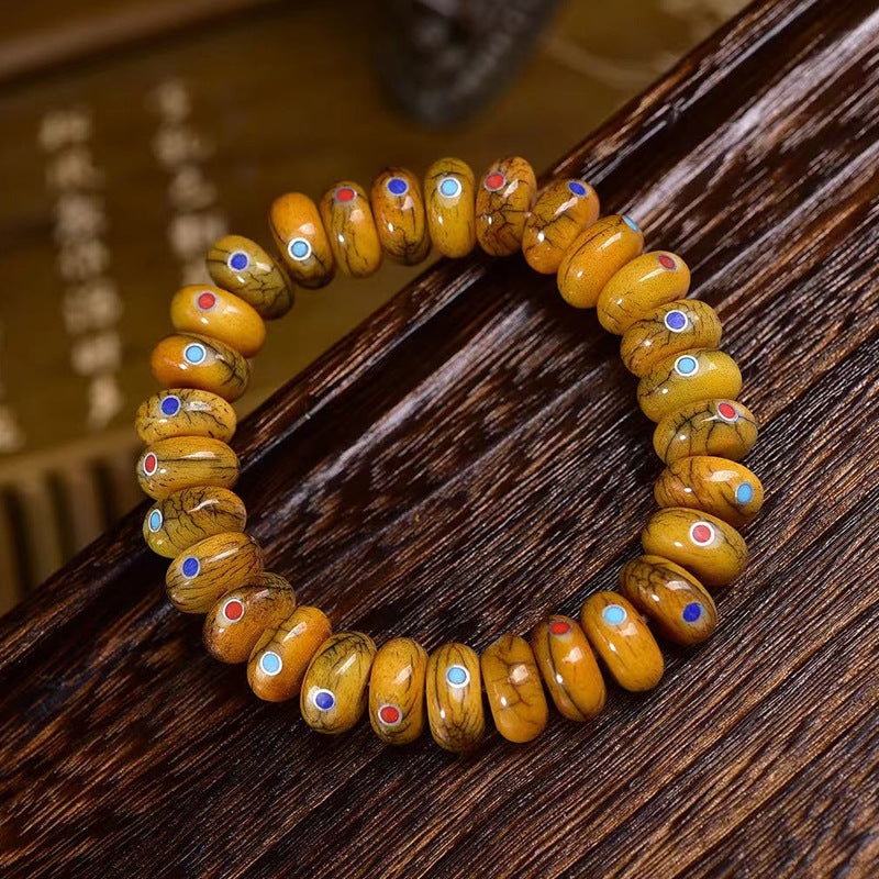 EverestArtstudios Yak Bone Inlaid Disc Bead Bracelet