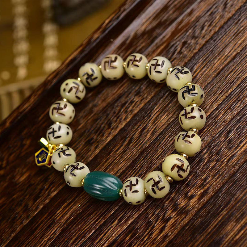 EverestArtstudios Bone Auspicious Symbol Carved Bead Bracelet