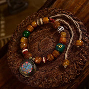 EverestArtstudios Camel Bone Barrel Bead Green Tara Charm Bracelet
