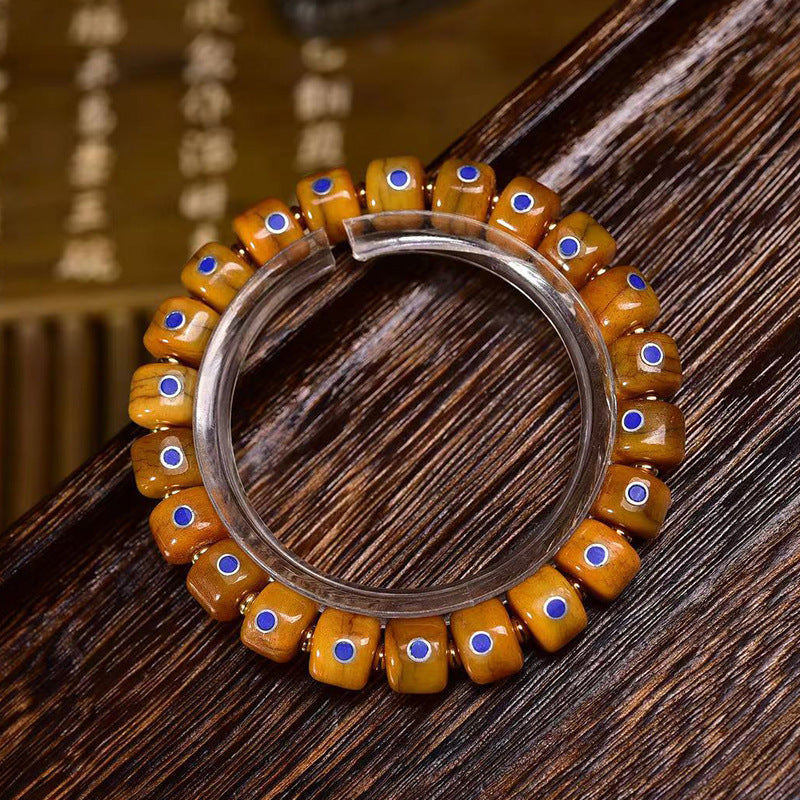 EverestArtstudios Yak Bone Lapis Inlay Thangka Charm Bracelet