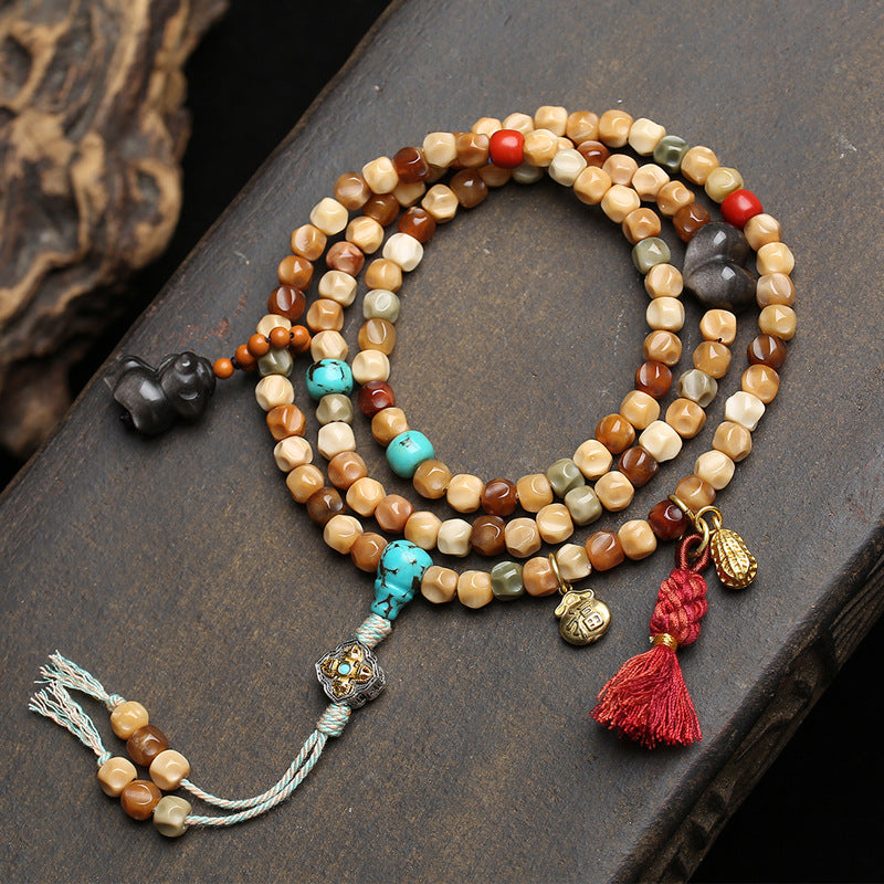 EverestArtstudios Faceted Bodhi 108-Bead Mala with Turquoise and Obsidian Accents