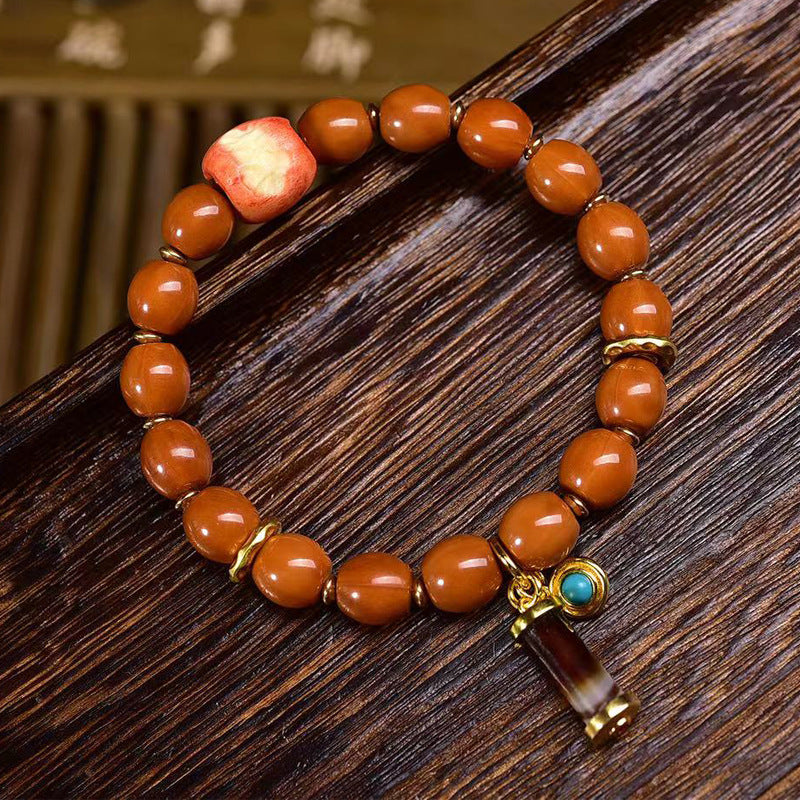 EverestArtstudios Monkey Head Bodhi Seed Banded Agate Bracelet