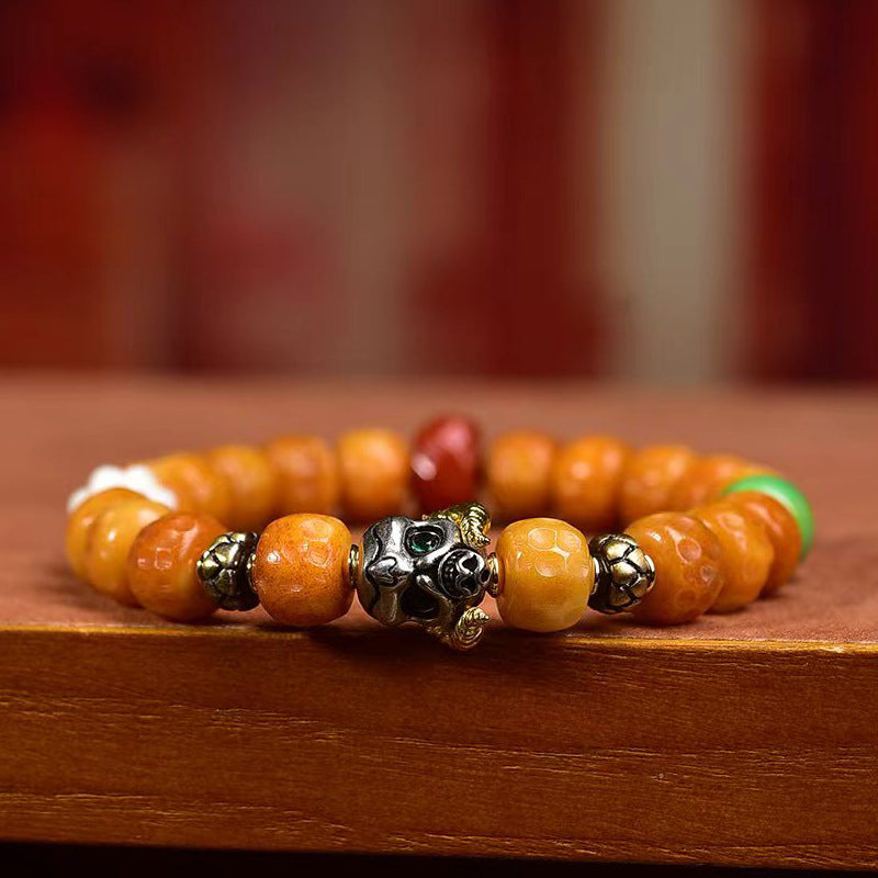 EverestArtstudios Bone Textured Barrel Bead Garuda Accent Bracelet