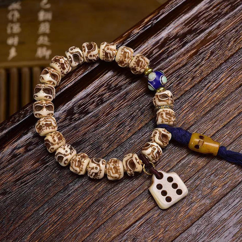 EverestArtstudios Bone Garuda Motif Copper Accent Bracelet