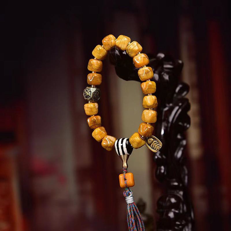 EverestArtstudios Camel Bone Carved Seed-Pattern Tassel Bracelet