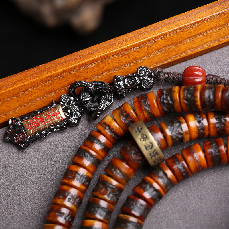 EverestArtstudios Yak Bone 108-Bead Mala with Wealth Deity and Mantra Motifs
