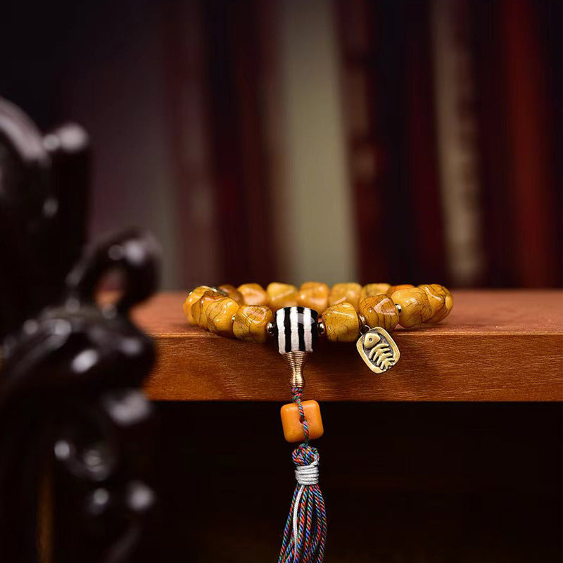 EverestArtstudios Camel Bone Carved Seed-Pattern Tassel Bracelet