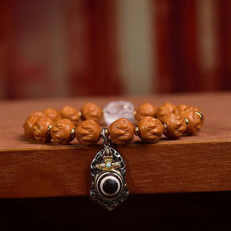 EverestArtstudios Monkey Head Bodhi Seed Carved Crystal Accent Bracelet