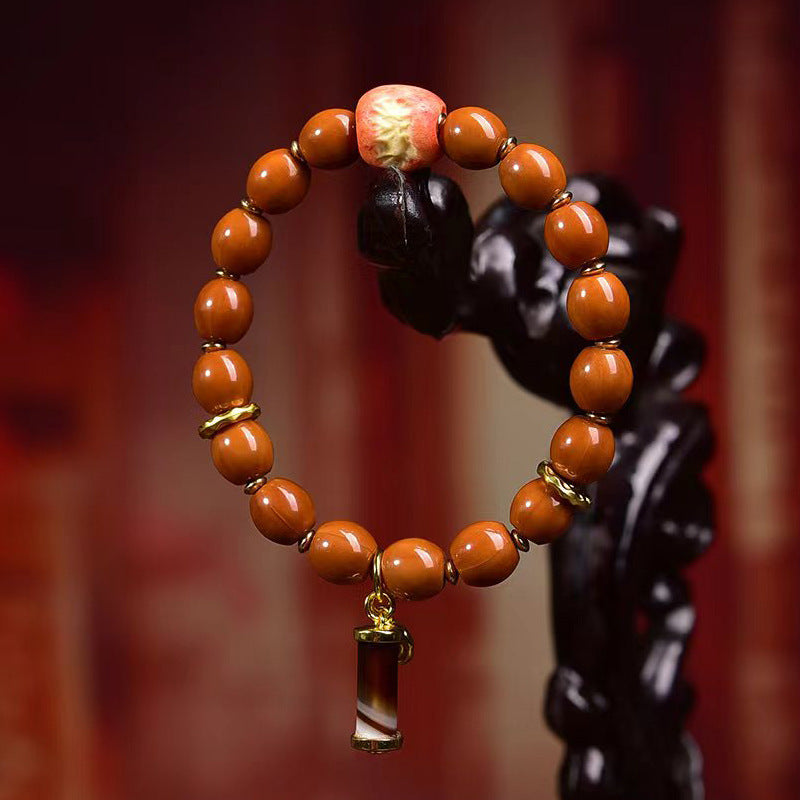 EverestArtstudios Monkey Head Bodhi Seed Banded Agate Bracelet