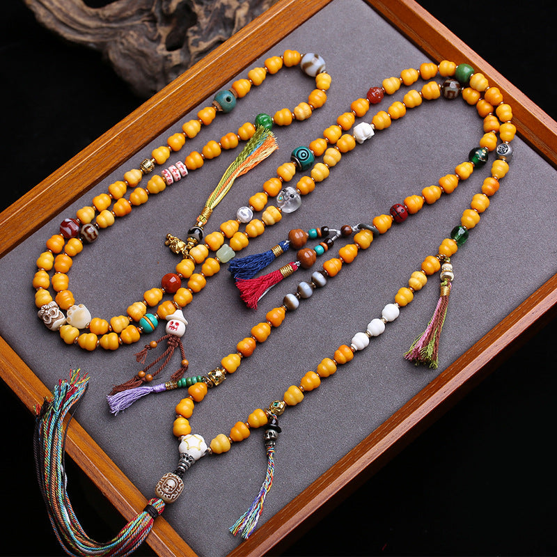 Tibetan return bone carving Fulu oblique span gourd yak bone back cloud agate tiger tooth dzi bead material glazed accessories