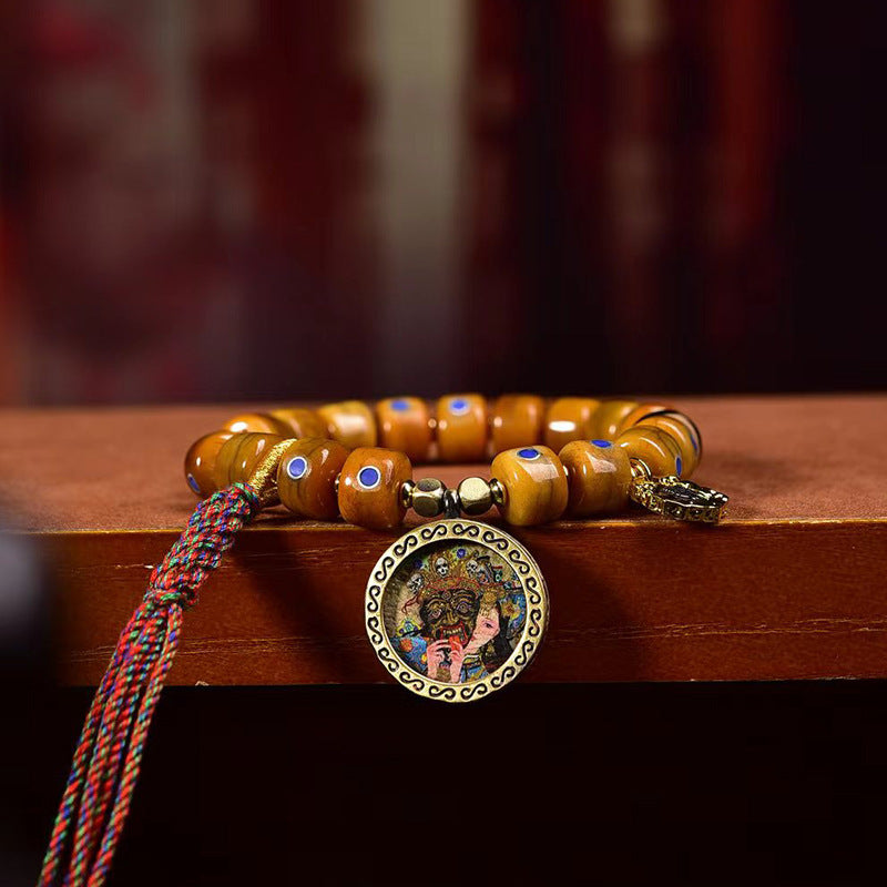 EverestArtstudios Yak Bone Lapis Inlay Thangka Charm Bracelet