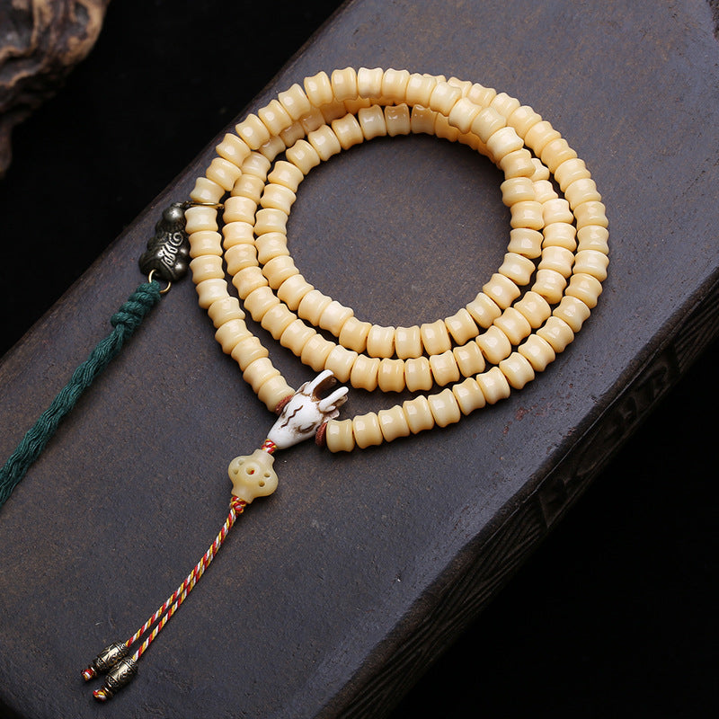 Tibetan return bone carving is 108 Buddha beads high, multi-circle bracelet plate playing beaded Tibetan side hanging copper accessories