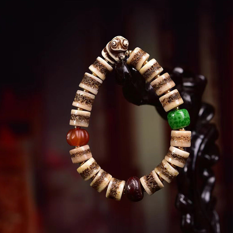 EverestArtstudios Yak Bone Textured Barrel Bead Bracelet