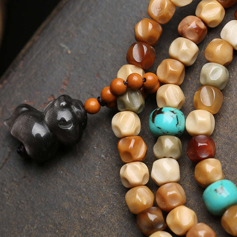 EverestArtstudios Faceted Bodhi 108-Bead Mala with Turquoise and Obsidian Accents