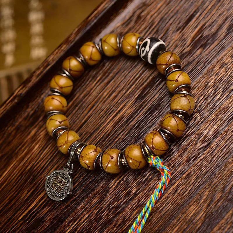EverestArtstudios Bone Inlaid Barrel Bead Tassel Bracelet