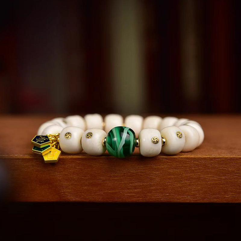 EverestArtstudios Antler Auspicious Symbol Barrel Bead Bracelet