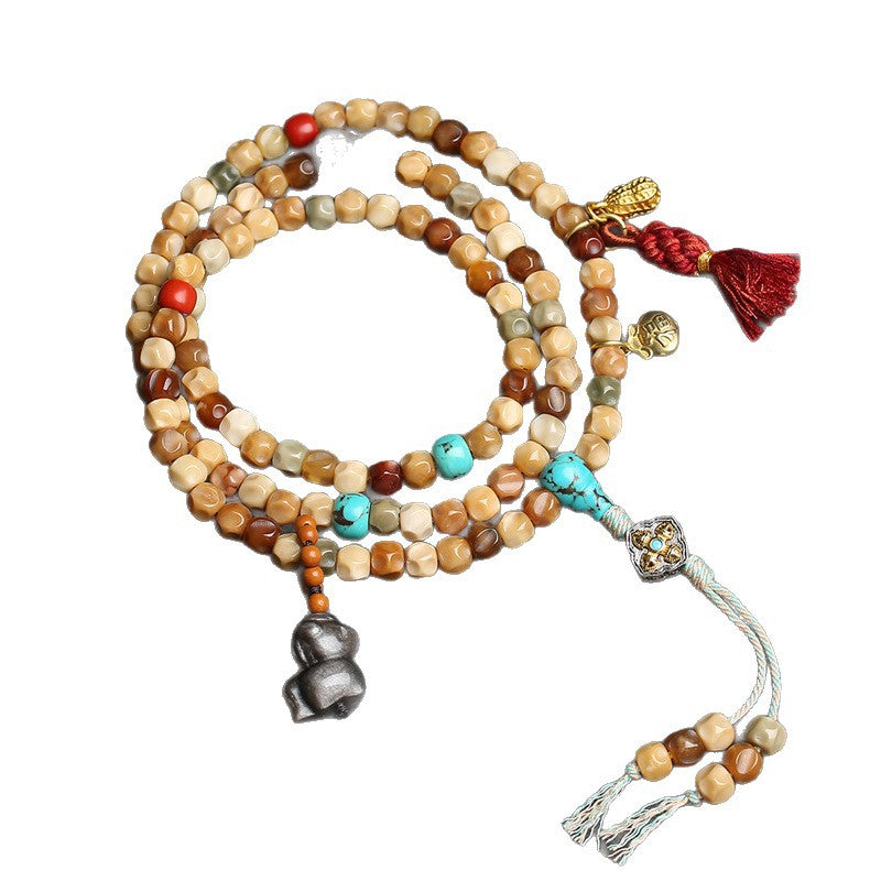 EverestArtstudios Faceted Bodhi 108-Bead Mala with Turquoise and Obsidian Accents