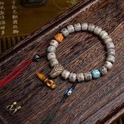 EverestArtstudios Bone Inlaid Barrel Bead Tassel Bracelet