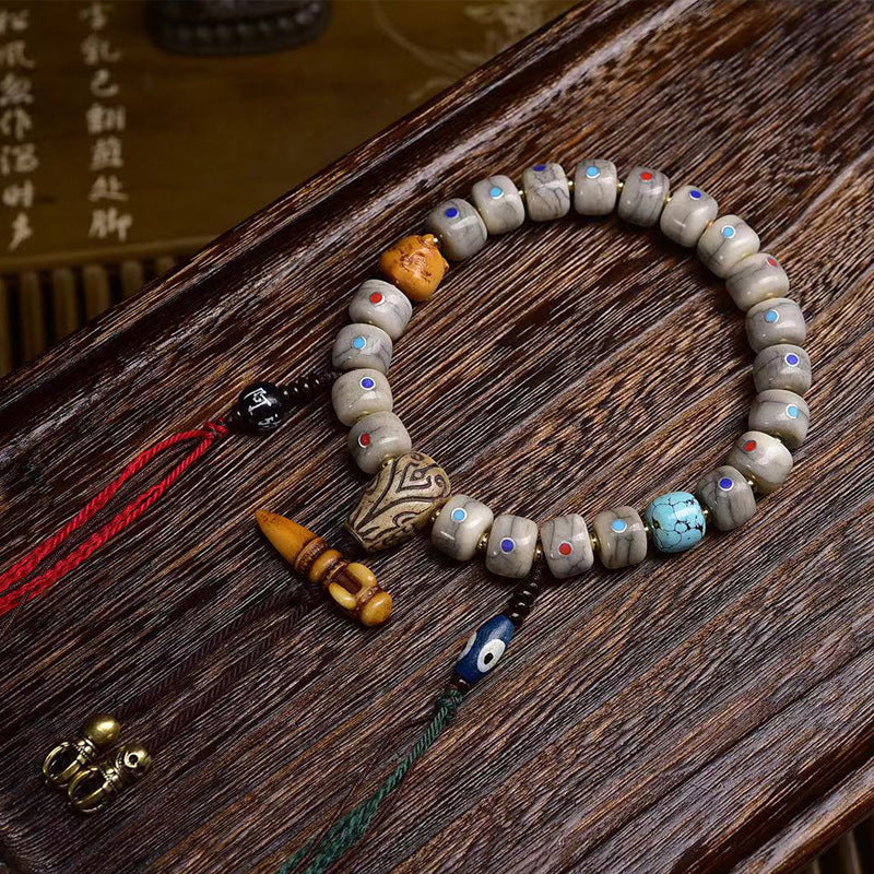 EverestArtstudios Bone Inlaid Barrel Bead Tassel Bracelet