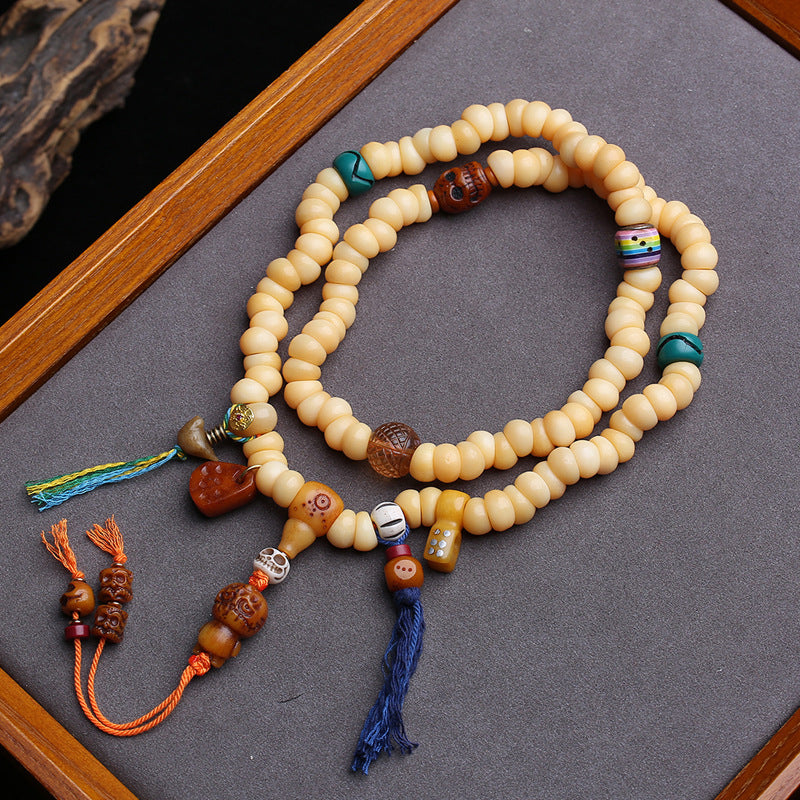Tibetan return camel bone chicken oil yellow large intestine beads 108 Buddha beads yak bone tee Dumby clip accessories